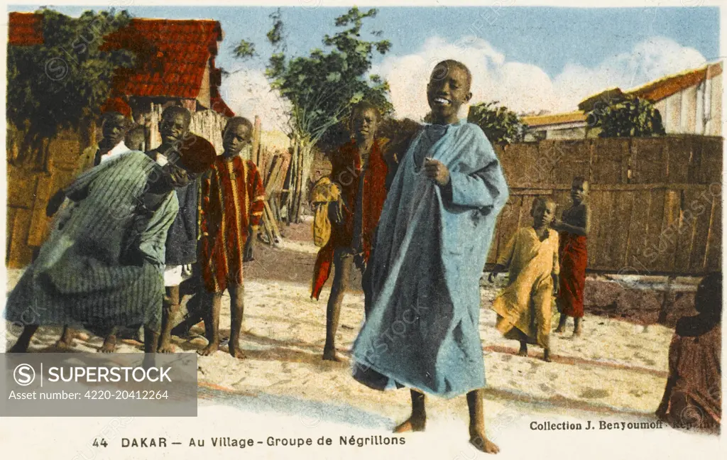 Children playing in the street in Dakar, Senegal     Date: 1930s