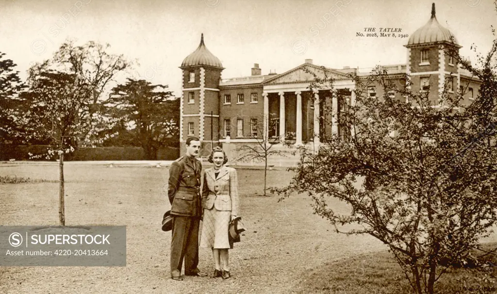 Lord and Lady Jersey (George Child Villiers, 9th Earl of Jersey and his second wife, American actress Virginia Cherrill) in Osterley Park in the suburbs of west London. Lord Jersey is home on leave and is in uniform.     Date: May 1940