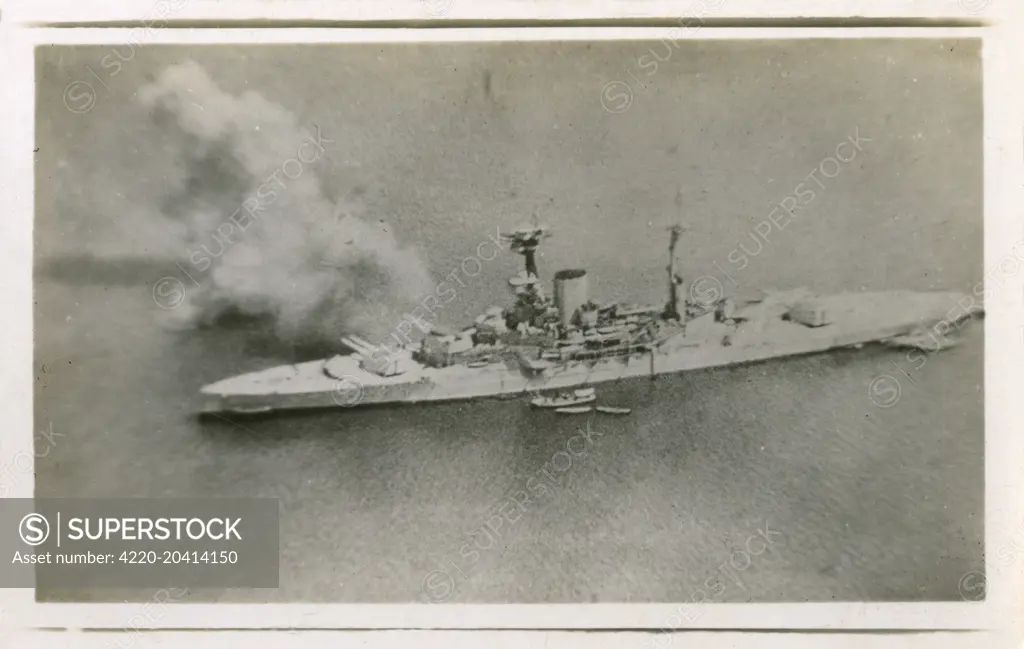 Birds eye view (taken from a seaplane) of the British warship HMS Ramillies bombarding Turkish positions in the Gulf of Ismid in early July 1920     Date: Early July 1920