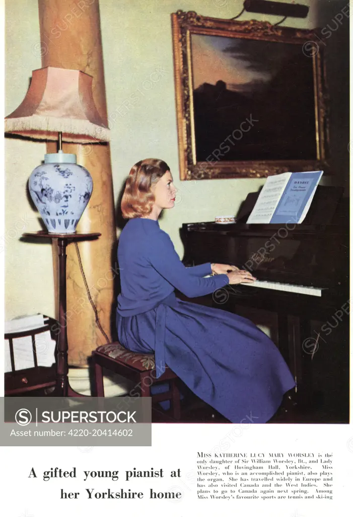 Miss Katherine Lucy Mary Worsley, the present Duchess of Kent, pictured playing the piano at her home, Hovingham Hall, Yorkshire.  The Tatler mentions that Miss Worsley's favourite sports are tennis and skiing and that she is an accomplished pianist who also plays the organ.     Date: 1957