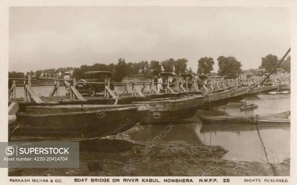 Boat bridge on River Kabul, Nowshera, North West Frontier Province (Pakistan).  circa 1920s