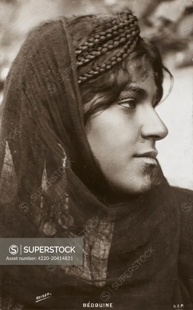 Bedouin Woman from Egypt with a very interesting chin tattoo     Date: circa 1910