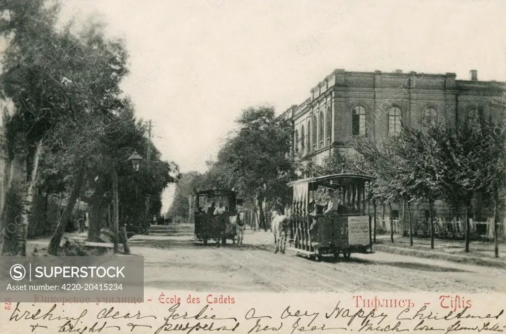 Cadets Military School at Tbilisi, the capital (and largest) city in Georgia  formerly known as Tiflis. Located strategically at the crossroads between Europe and Asia and lying along the historic Silk Road routes, Tbilisi has often been the point of contention between various rivaling powers and empires.     Date: circa 1908