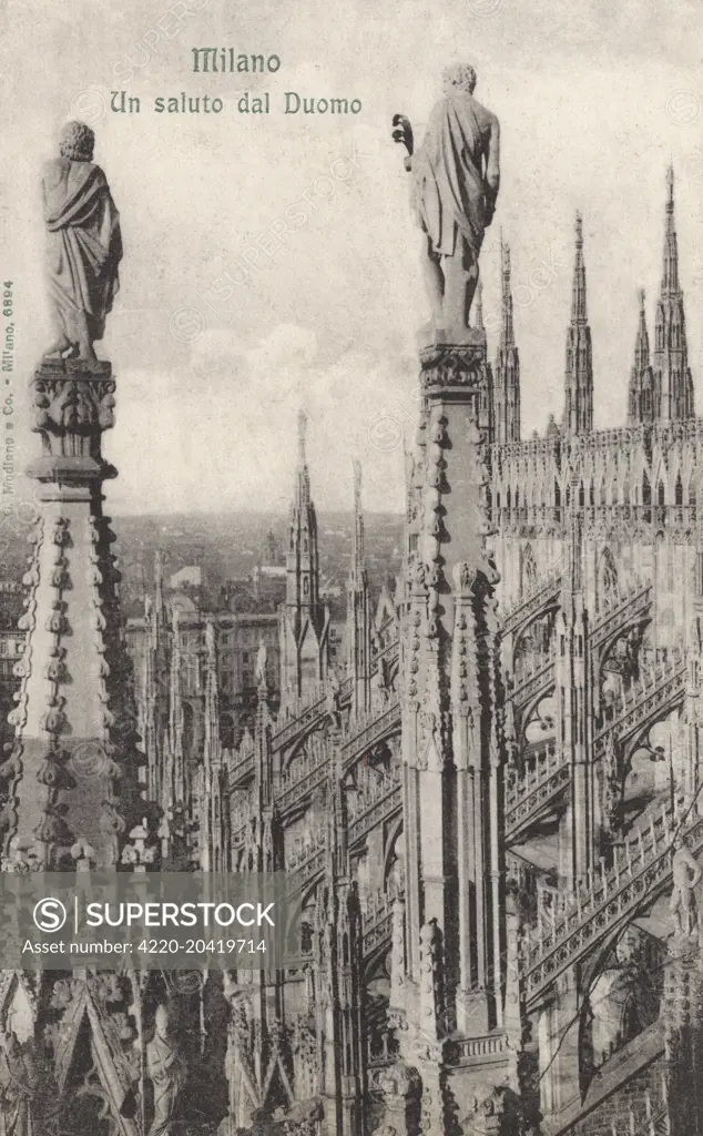 Statues on the pinacles of the roof of Milan Cathedral - a masterpiece of Gothic architecture.     Date: circa 1910s