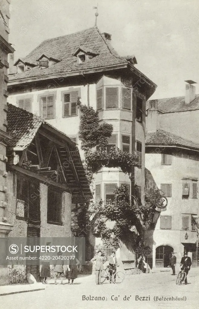 Bolzano, Italy - The Ca 'de Bezzi, the oldest Inn in Bolzano. This historic tavern is late medieval (15th century) in date and built by the Teutonic Order. The name is inferred from an ancient coin, Batzen (Bezzi) which corresponded to the price of a measure of wine. For centuries, the Ca 'de Bezzi was not only the Osteria of the Order of Teutonic Knights but in the nineteenth century it was the coterie of intellectuals, politicians and artists, from the Duke of Bavaria to the Austrian painter A