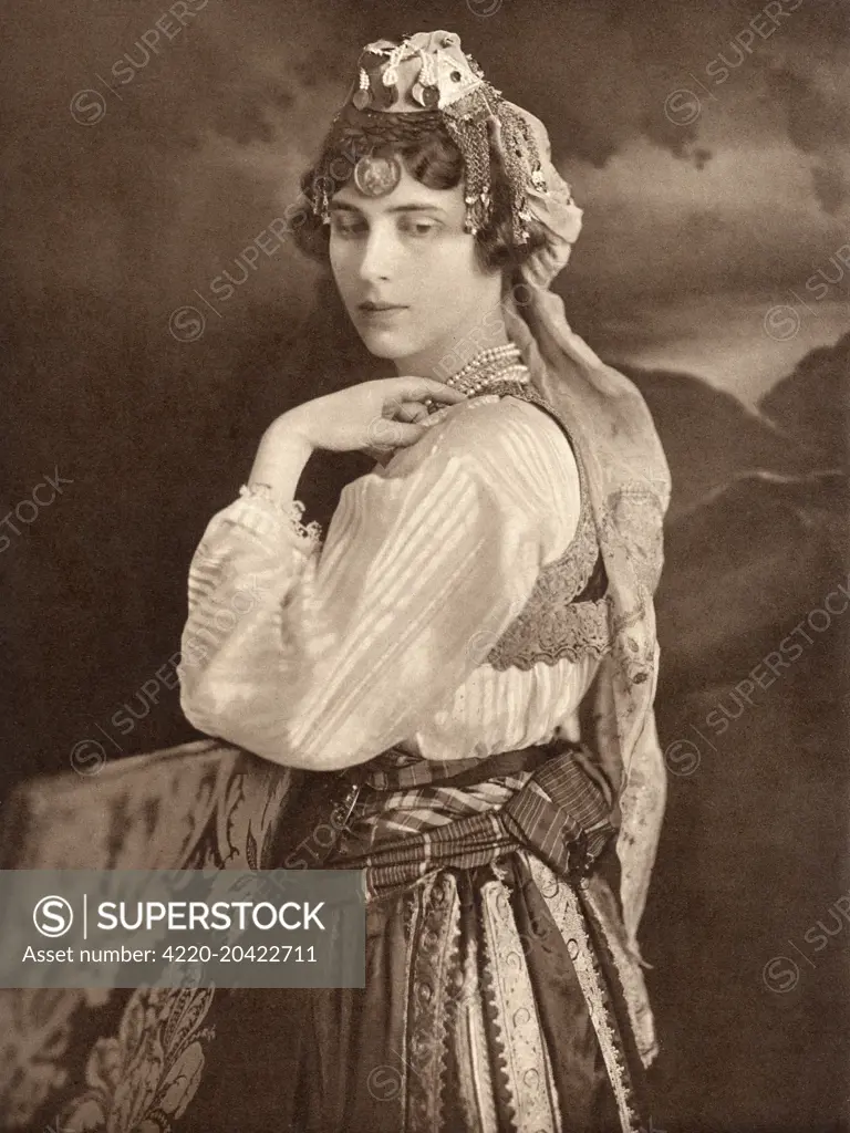 Princess Paul of Yugoslavia (1903 - 1997), formerly Princess Olga of Greece, eldest daughter of Prince Nicholas of Greece and Grand Duchess Helen Vladimirovna of Russia, sister of Princess Marina, Duchess of Kent.  Pictured in the Bosnian peasant costume she wore at the annual All-Slav Ball held in Belgrade earlier in 1934.     Date: 1934