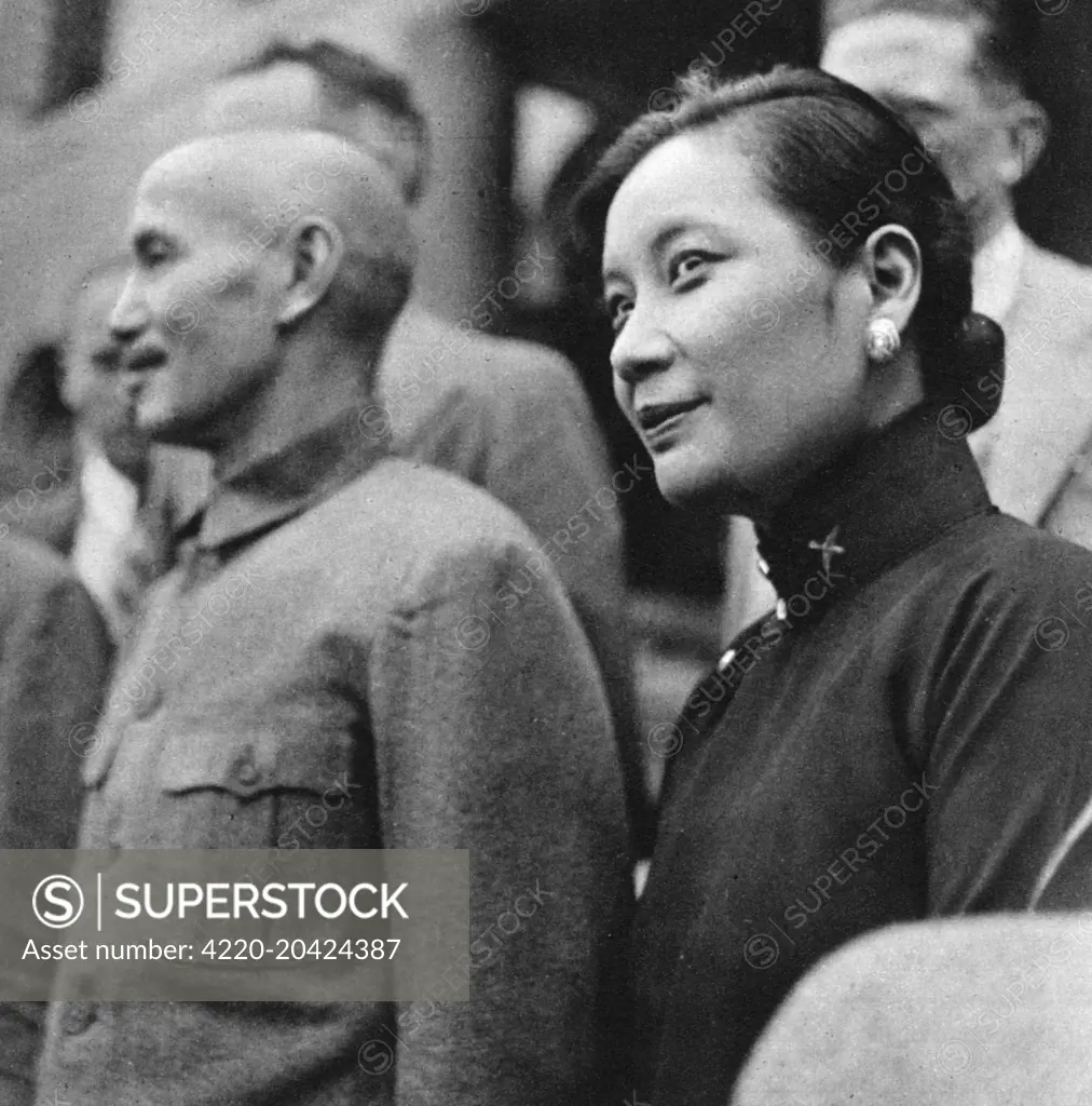 Madame Chiang Kai-Shek(also known as Soong May-ling or Soong Mei-ling)(1898- 2003), pictured with her husband General Chiang Kai-Shek at Chungking, China.     Date: 1941