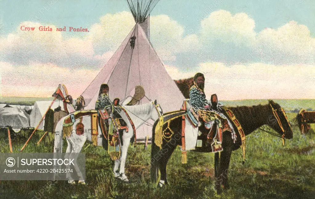 Two Crow Tribe girls with their ponies standing before their tipi (also tepee or teepee).     Date: 1911