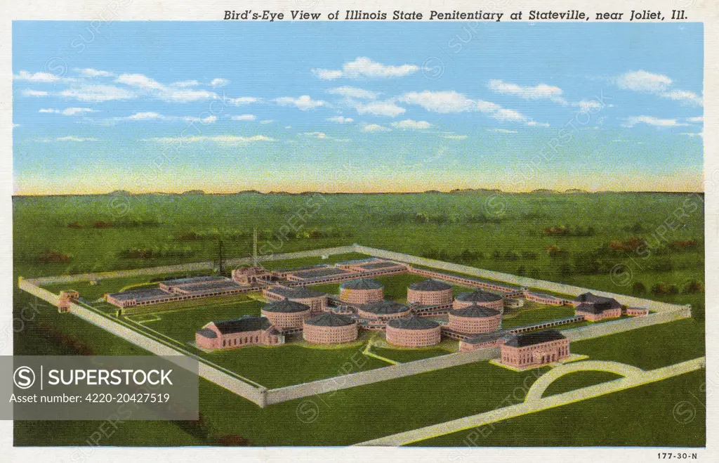 Exterior view of the Illinois State Penitentiary at Stateville, near Joliet. It was 2220 acres in total, 64 acres of which were within the walls show in this image. The exterior wall was 30ft. high, and one and a quarter miles in length. It was the largest prison complex in the USA at the time.   1930