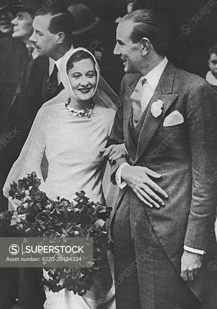 Mr Alec Hambro and Miss Baba (Barbara) Beaton pictured after their marriage at St Mark's, North Audley Street, London     Date: 6 November 1934