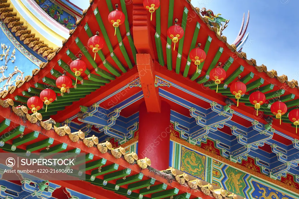 Red lanterns and roof decorations on the Thean Hou Chinese Temple, Kuala Lumpur, Malaysia  Paul Brown     Date: 