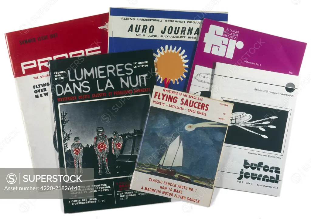 A selection of UFO journals, namely Lumieres dans la Nuit, Flying Saucers, Probe, Bufora Journal, FSR, and Auro Journal.      Date: circa 1970