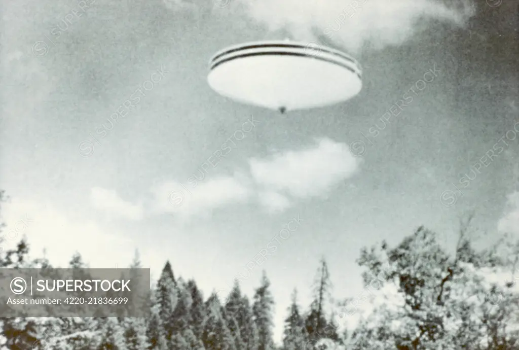 Contactee Daniel Fry, thanks to his extraterrestrial  friends, was able to film this spinning UFO over Merlin, Oregon.     Date: May 1964