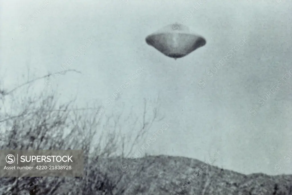 Contactee Daniel Fry  photographed this spinning UFO  at Joshua Tree, California 1 of 5       Date: 1965