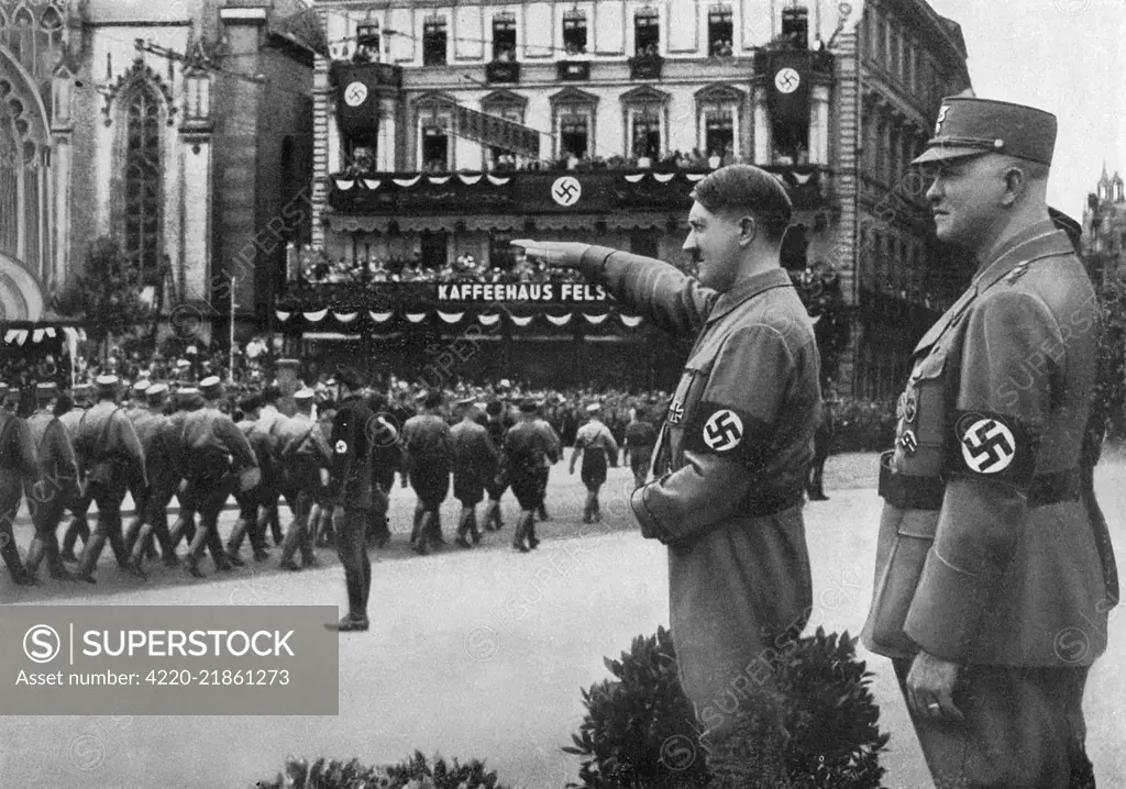 Nazis march past Hitler at  Leipzig.         Date: 1933