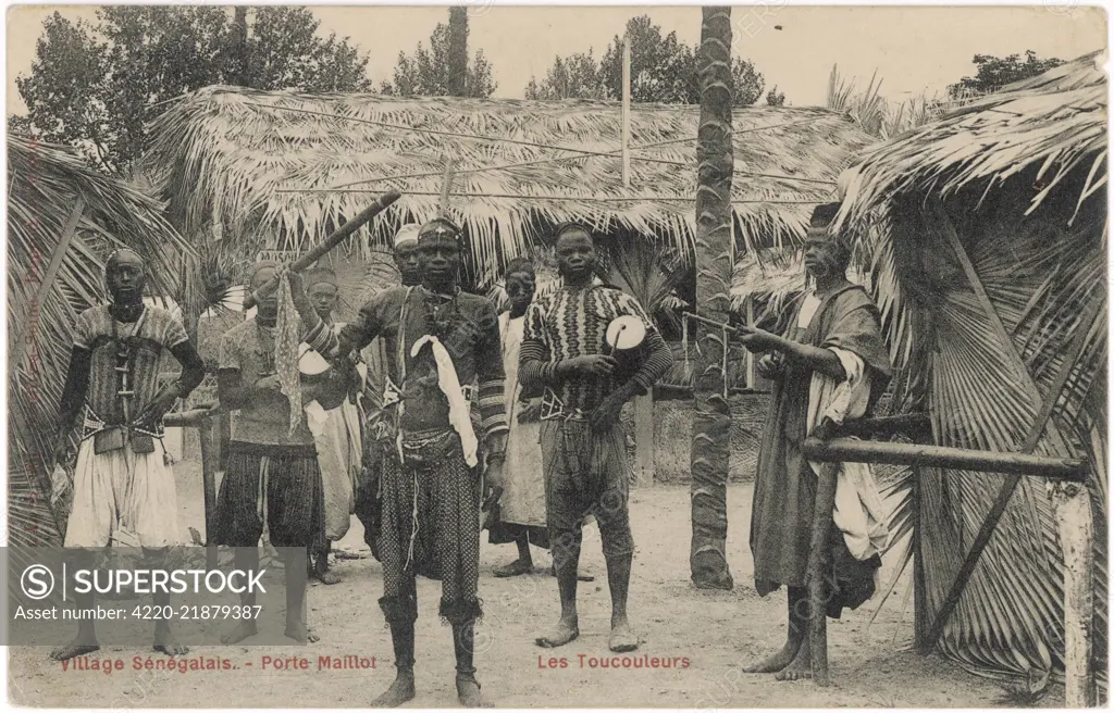 SENEGAL Men of Senegal in their  village, Porte Maillot        Date: 1908