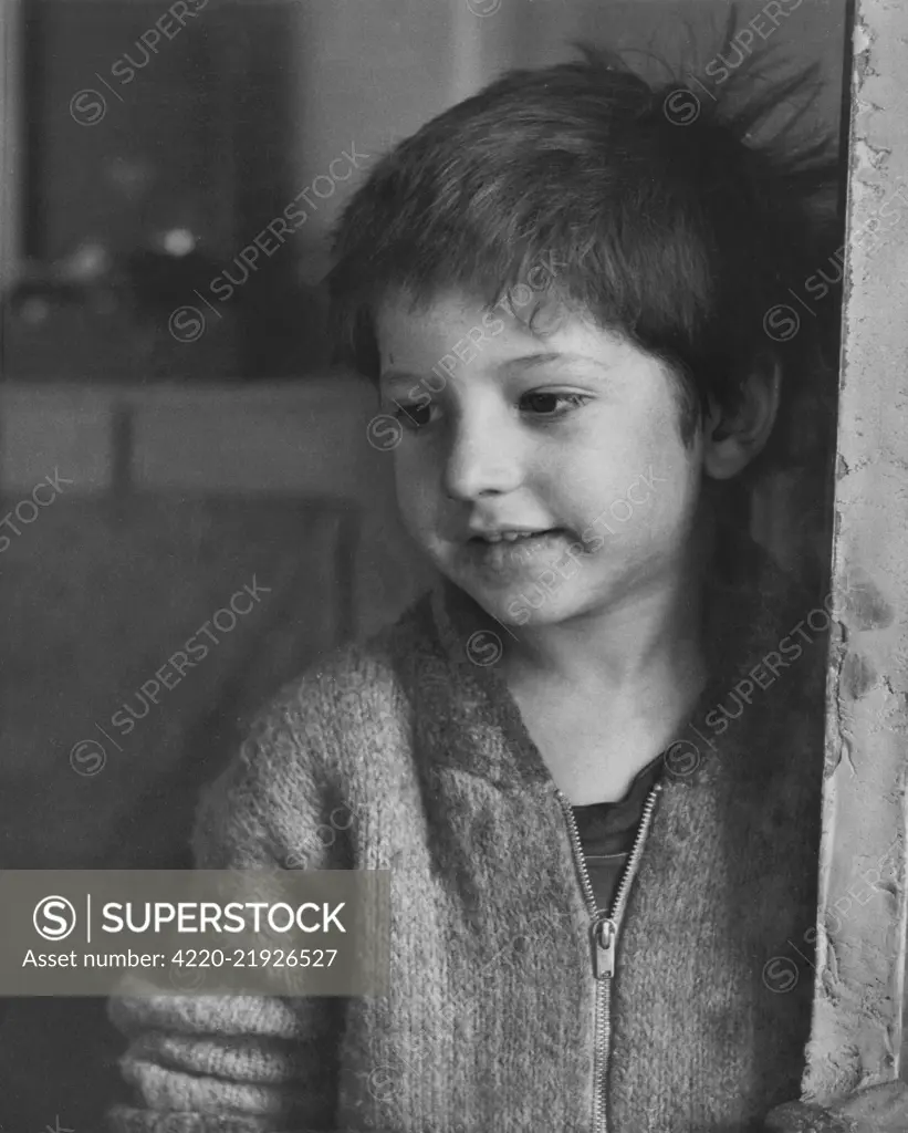 A young boy at the Abbe Pierre Emmaus Project in Paris. In 1949, Henri-Antoine Groues (Abbe Pierre) founded the Emmaus movement, with the goal of helping poor and homeless people and refugees.     Date: circa 1960