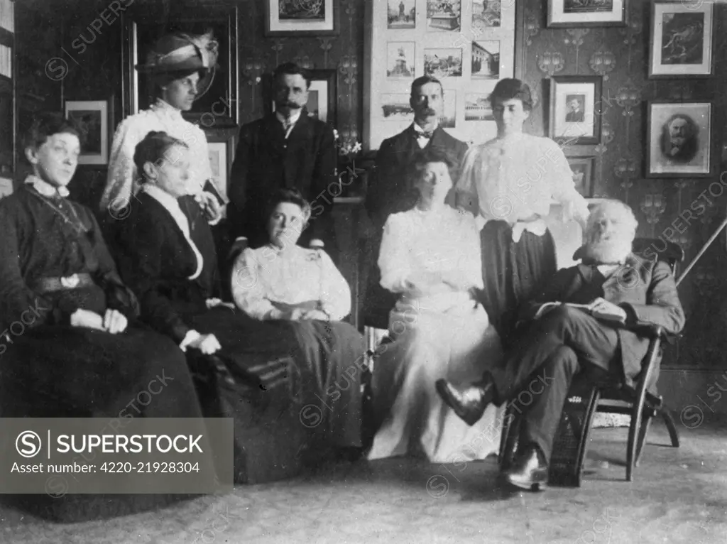 Group photo at the opening of Julia's Bureau, a seance circle, with W T Stead (far right) and staff.  The Bureau was based in Mowbray House, Norfolk Street, London, its purpose being to bridge the gap between the living and the dead.  Julia was a deceased American journalist, Julia Ames, who apparently communicated with Stead.      Date: 1909