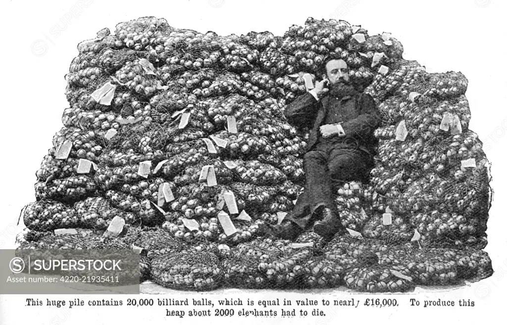 A huge pile of 20,000 billiard balls, equal in value to 16,000 (in 1909). To produce this heap about 2000 elephants had to die - a shocking statistic.     Date: 1909