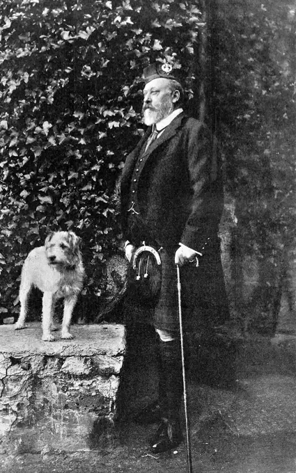 Portrait of Edward VII (1841-1910) in Scottish costume, accompanied by his dog.     Date: 1910