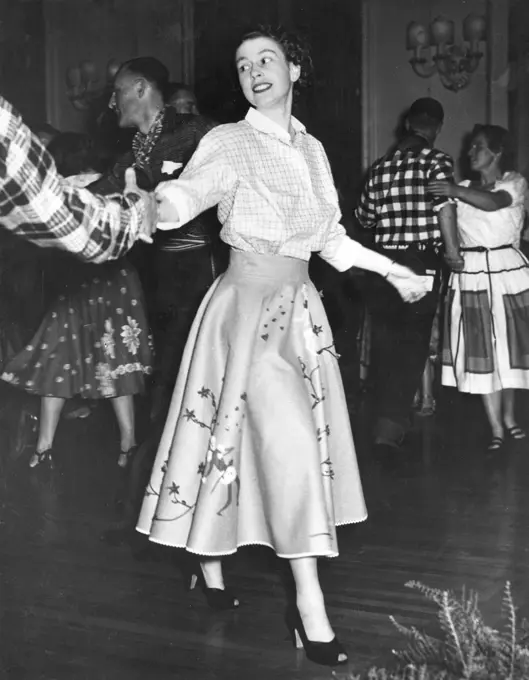 Princess Elizabeth (Queen Elizabeth II) dancing a Canadian Square Dance at Government House, Ottawa during he Royal Tour of 1951.     Date: 1951