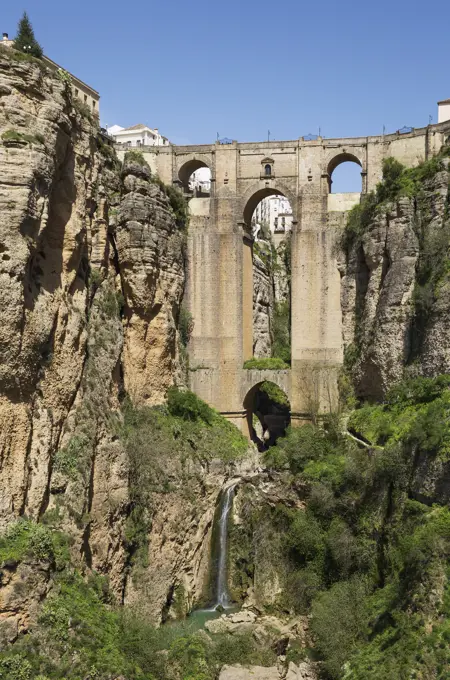 The White Town of Ronda high above the river gorge El Tajo   the river itself is called Guadalevin   Malaga province, Andalusia, Spain     Date: 