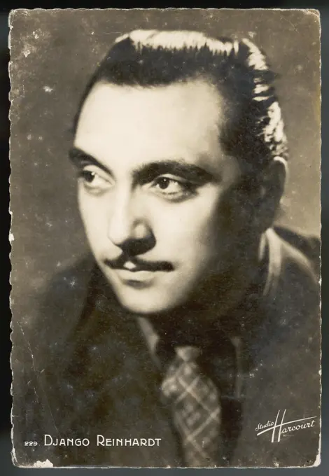 DJANGO REINHARDT (JEAN-BAPTISTE)  French jazz guitarist, born  in Belgium of gypsy parentage      Date: 1910 - 1953