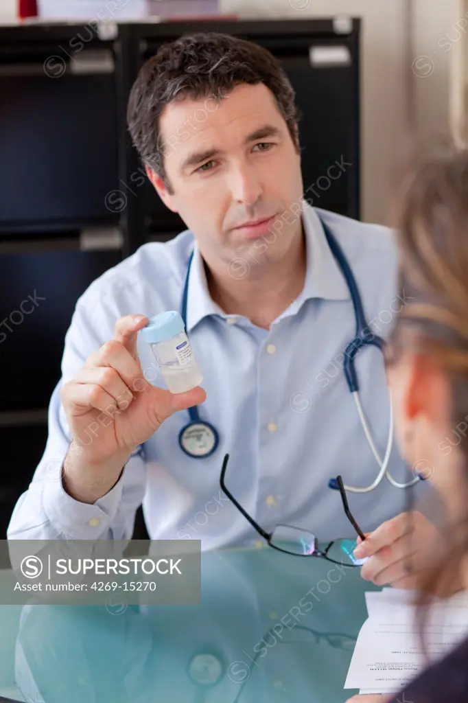 Woman undergoing cervical smear test (pap smear), a screening test for cervical cancer and STD.