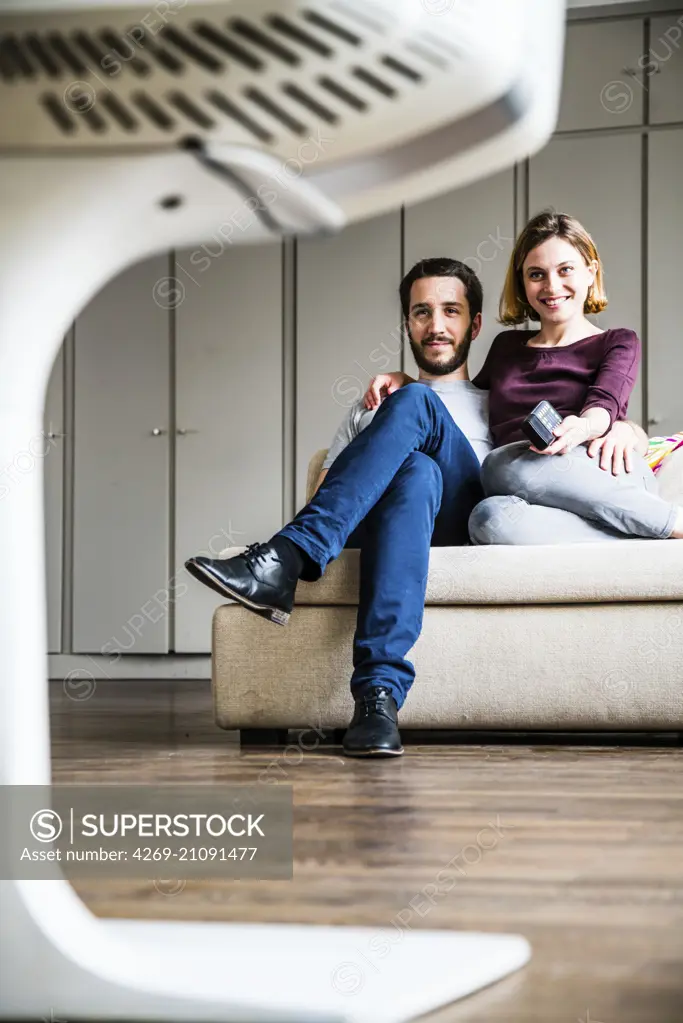 Couple watching TV.