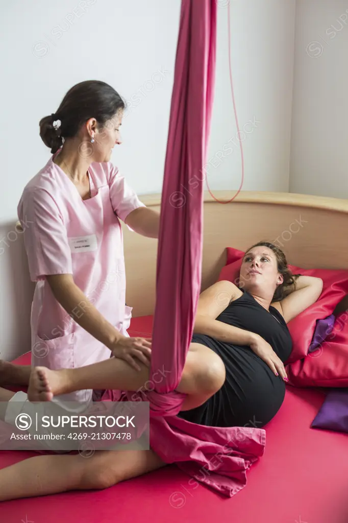 Pregnant woman during early labour at a natural birthing centre., Centre clinical de Soyaux, France.