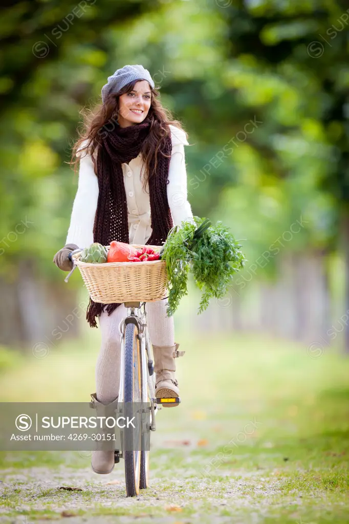 Woman riding her bike.