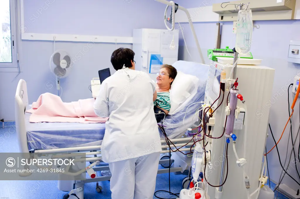 Haemodialysis. Patient undergoing haemodialysis treatment. Limoges hospital, France.