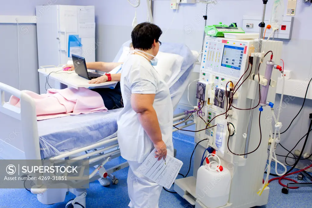 Haemodialysis. Patient undergoing haemodialysis treatment. Limoges hospital, France.