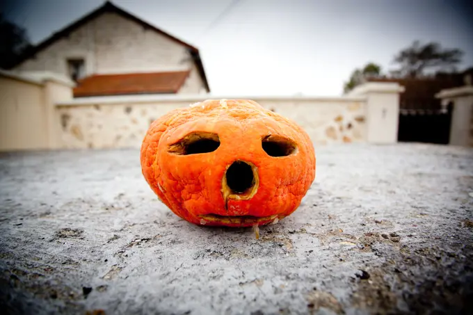 Carved pumpkin for Halloween.