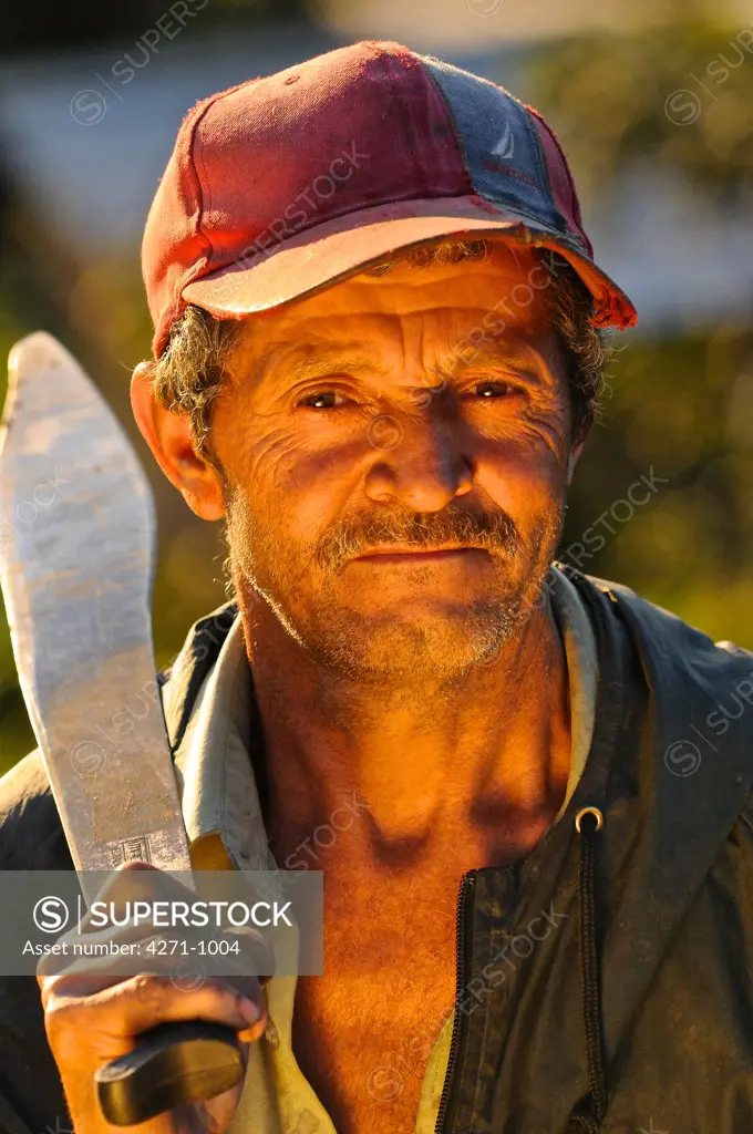 Nicaragua, Dipilto, Portrait of farmer holding machete in the mountainous Nueva Segovia