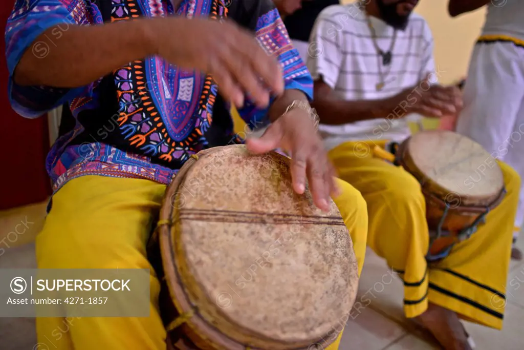 Garifuna playing the skin drums. The Garifuna,  descendants of Carib, Arawak, and West African people. The Garifuna music was proclaimed by UNESCO one of the masterpieces of the Oral and Intangible Heritage of Humanity in 2001.