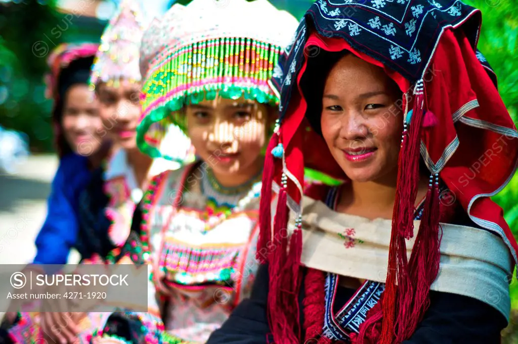 Young girls wearing traditional clothing from  Laos