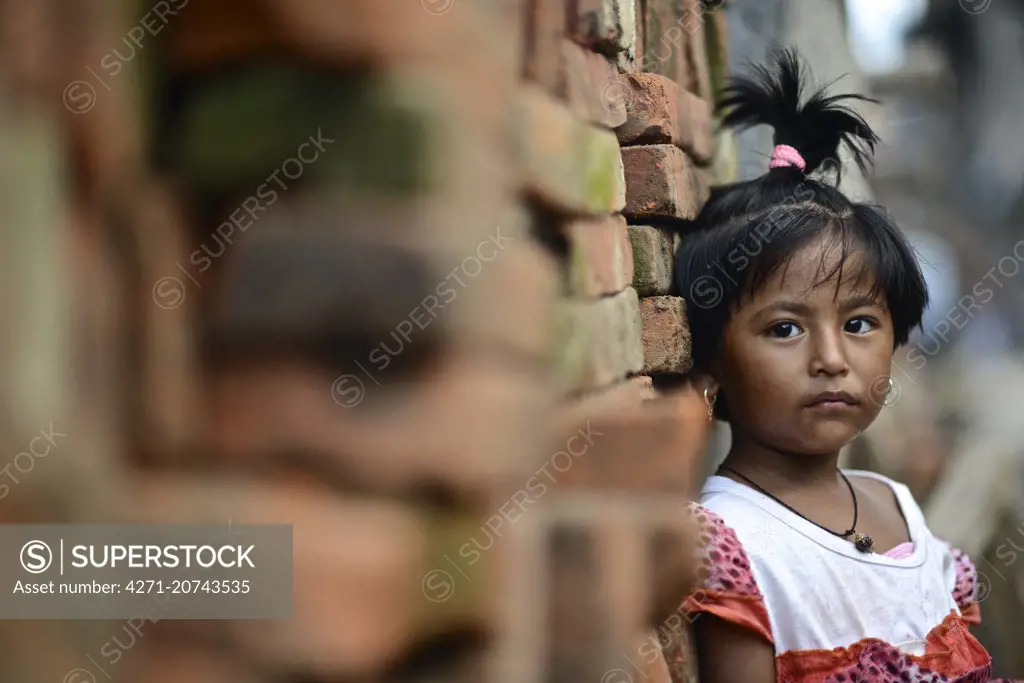 Nepali children return home after a day at school. Daily life tries to return to normal after the immense devastation of the April 2015 earthquake in Nepal