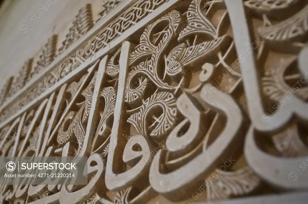 Arabesques around a window. The Alhambra Palace