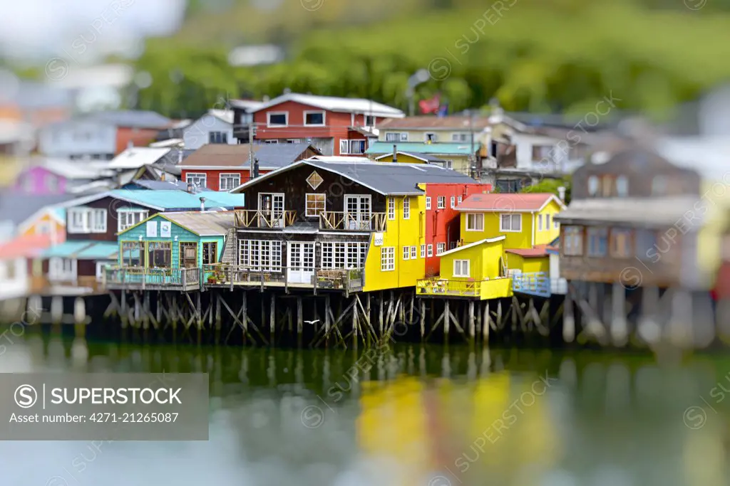 The colorful houses on the water, known as palafitos, in the town of Castro, Island of Chiloé, Chile.