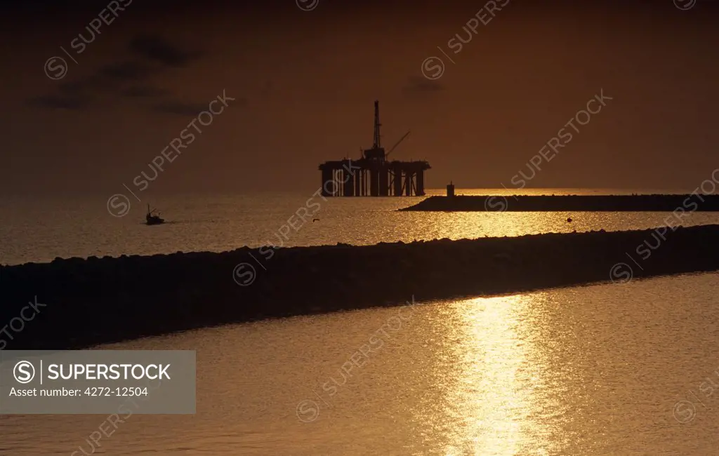 Ghana, Western Region, Takoradi. An oil rig by Takoradi Port.