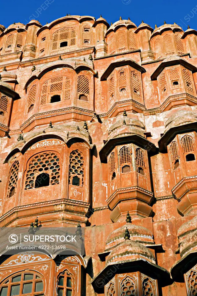 Hawa Mahal; or the Palace of  the Wind in the middle of Johari Bazaar and part of the zenana palace (women's quarters) designed by Lalchand Usta in 1799. Jaipur; Rajasthan; India.