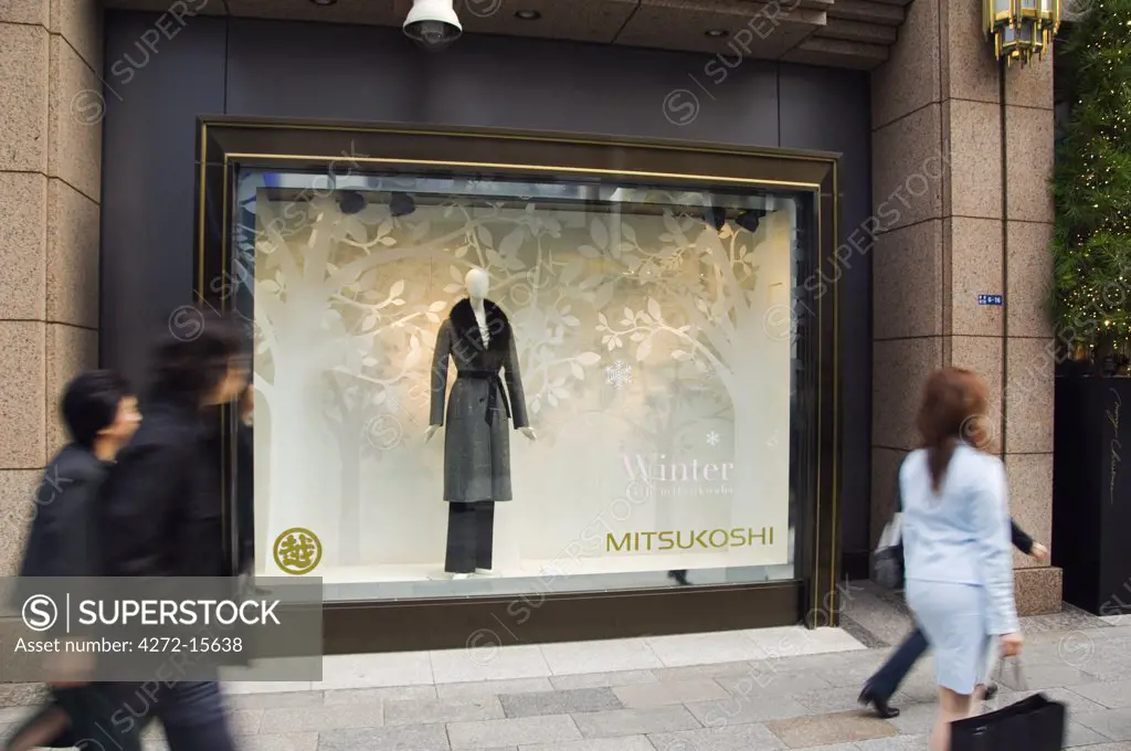 Japan, Honshu Island, Tokyo, Ginza District. Mitsukoshi department store window display.