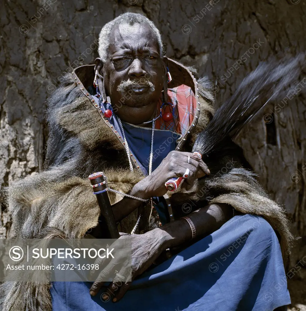 Ole Senteu Simel, grandson of the famous Maasai Laibon  Mbatian (after which the highest peak of Mount Kenya is named), was the most respected laibon of the Maasai until his death in 1986.  This photograph was taken three weeks before he died. Maasai Laibons are the soothsayers and clairvoyants of the tribe and control all ceremonial occasions.