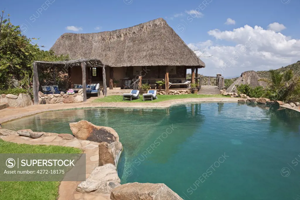 Kenya, The swimming pool of Borana Lodge, situated on a private 35,000-acre ranch overlooking Mount Kenya in Laikipia District.