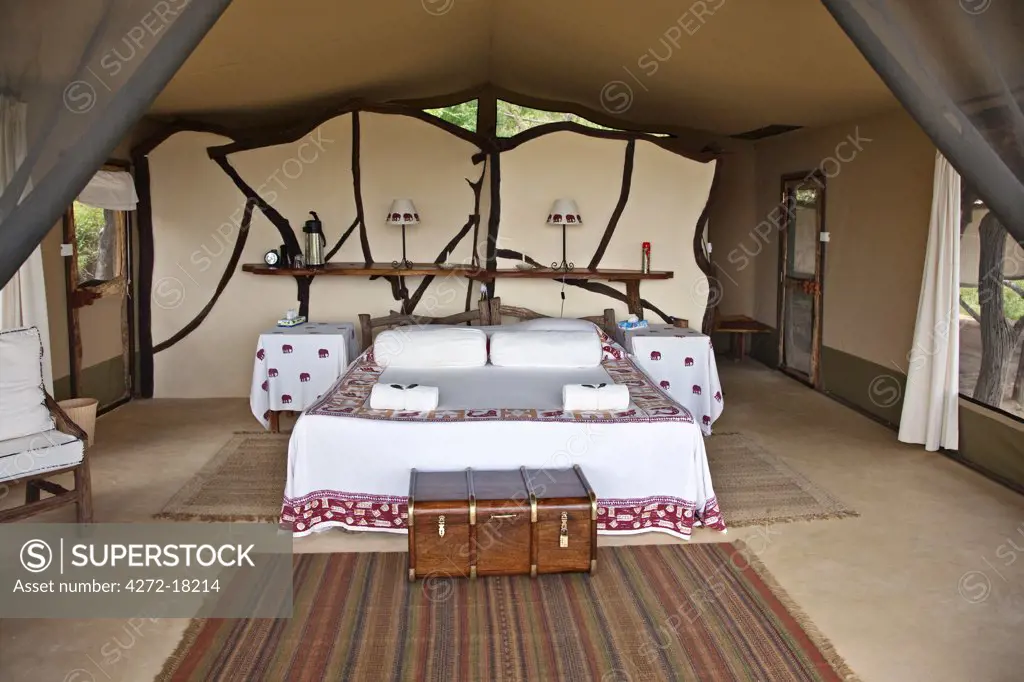 Kenya, A bedroom at Sarara Camp, a luxurious ecolodge situated near the magnificent Mathews Mountains of Northern Kenya.