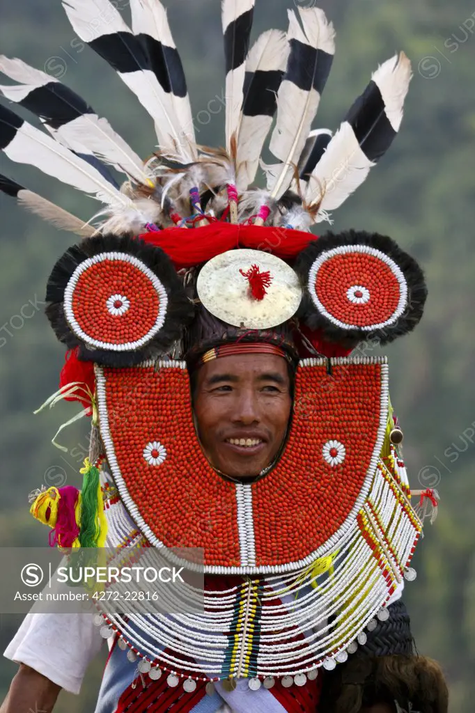 Myanmar, Burma, Naga Hills.  A Tangkhul Naga in his ceremonial finery celebrating the Naga New Year Festival (Kaing Bi) in Leshi village.