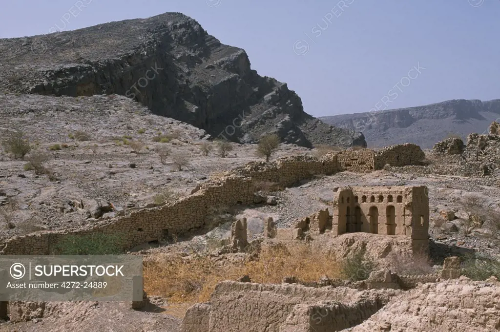 The ruined town Tanuf, former stronghold of Suleiman Bin Himyar a rebel leader in the Jebel Wakhdar War, and destroyed on the orders of the Sultan.