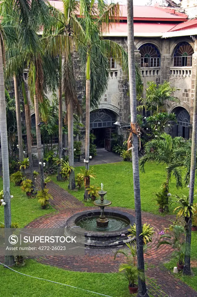 Philippines, Luzon, Manila. Intramuros - spanish colonial district - San Agustin Church (built between 1587-1606) is the oldest Church in the Philippines and is a Unesco World Heritage Site. Museum garden.