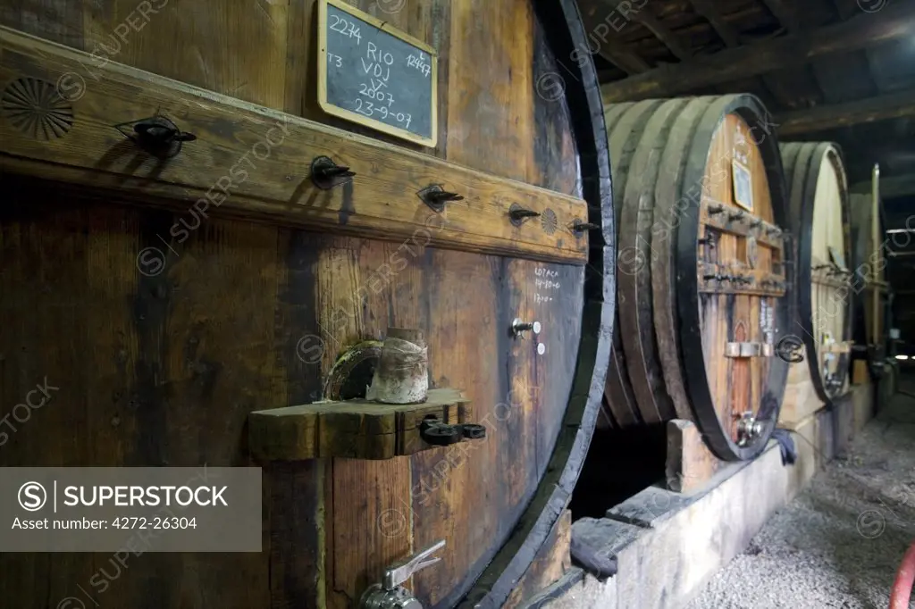 Portugal, Douro Valley, Pinhao. Traditional Port Wine Barrels in Northern Portugal in the renowned Douro valley. The valley was the first demarcated and controlled winemaking region in the world.